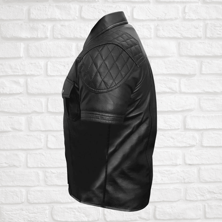 Men's leather shirt,
Short sleeve leather shirt,
Black leather shirt men,
Stylish leather shirt for men,
Quilted leather shirt,
Biker leather shirt,
Motorcycle leather shirt,
Casual leather shirt,
Men's fashion leather shirt,
Leather shirt with pockets,
Leather shirt with quilted design,
Short sleeve biker shirt,
Black quilted leather shirt,
Leather shirt with button pockets,
Silver button leather shirt,
Rugged leather shirt men,
Faux leather shirt men,
High-quality leather shirt,
Leather shirt for summer